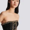 Abito bustier con ricami di paillettes Abito bustier con ricami di paillettes