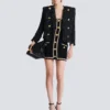 Abito in tweed con bordi in perle Abito in tweed con bordi in perle