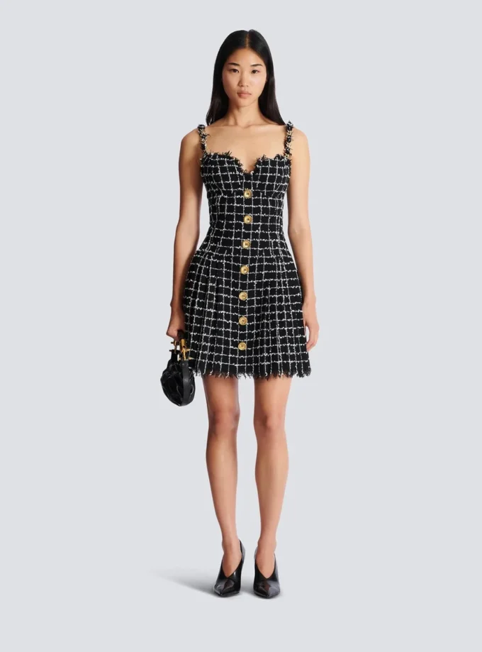 Abito in tweed con spalline a catena Abito in tweed con spalline a catena