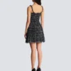 Abito in tweed con spalline a catena Abito in tweed con spalline a catena