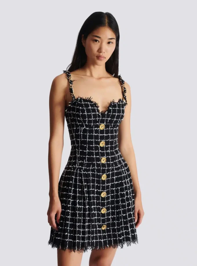 Abito in tweed con spalline a catena Abito in tweed con spalline a catena