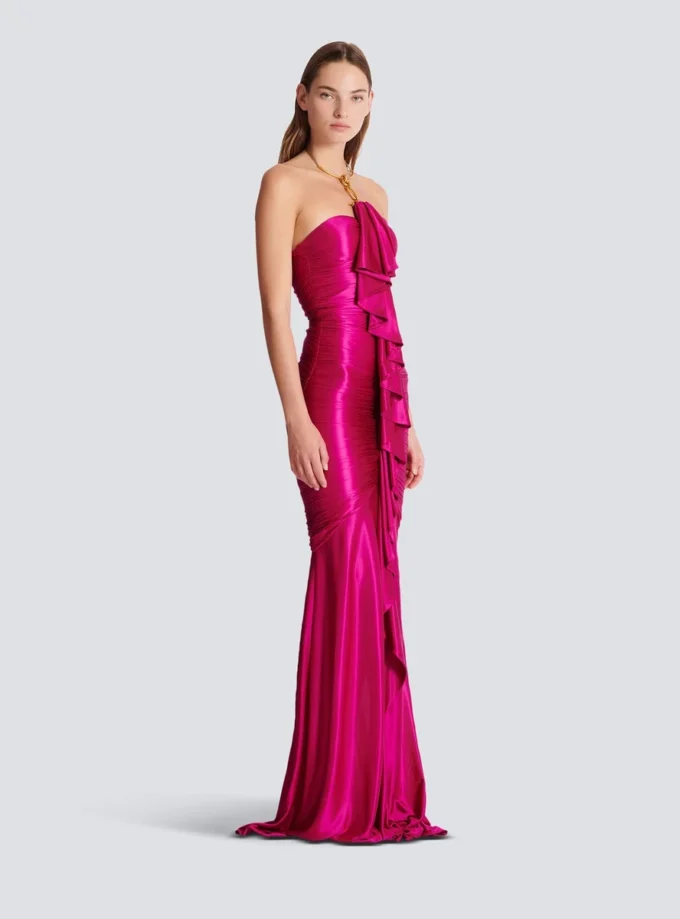 Abito lungo drappeggiato con bustier e dettagli decorativi Abito lungo drappeggiato con bustier e dettagli decorativi
