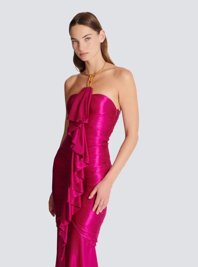 Abito lungo drappeggiato con bustier e dettagli decorativi Abito lungo drappeggiato con bustier e dettagli decorativi