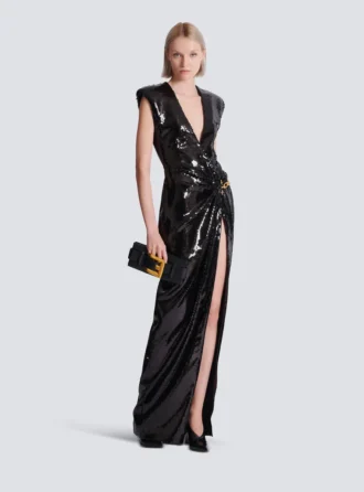 Abito lungo drappeggiato con paillettes e dettagli decorativi