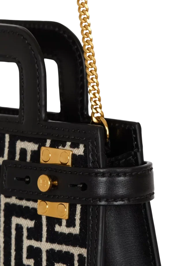 Borsa B-Buzz Small Top Handle in tela monogrammata e pelle Borsa B-Buzz Small Top Handle in tela monogrammata e pelle