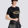 Borsa B-Buzz Small Top Handle in tela monogrammata e pelle Borsa B-Buzz Small Top Handle in tela monogrammata e pelle