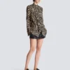 Camicia con volant e stampa leopardata Camicia con volant e stampa leopardata