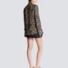 Camicia con volant e stampa leopardata Camicia con volant e stampa leopardata
