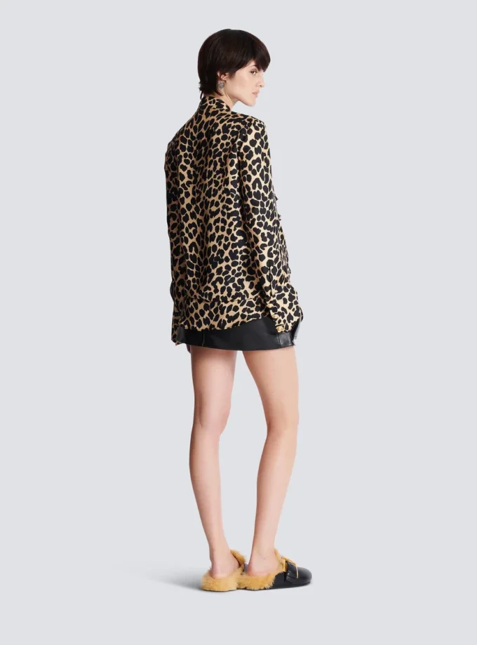 Camicia con volant e stampa leopardata Camicia con volant e stampa leopardata