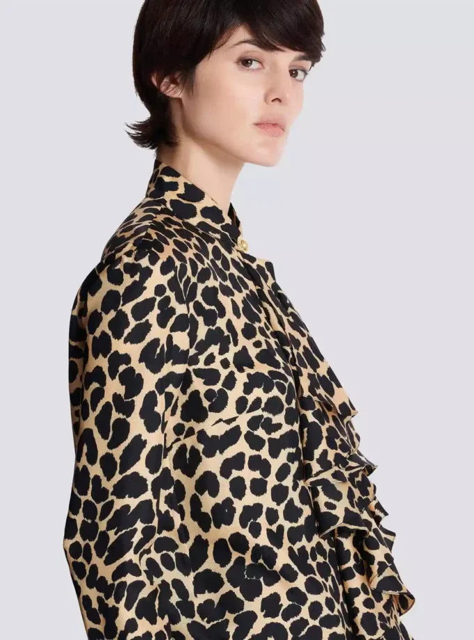 Camicia con volant e stampa leopardata Camicia con volant e stampa leopardata