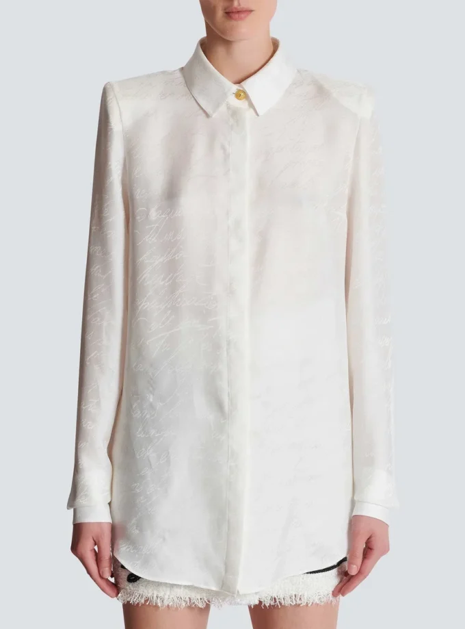 Camicia in cotone col con ricamo a forma di lettera d’amore Camicia in cotone col con ricamo a forma di lettera d’amore