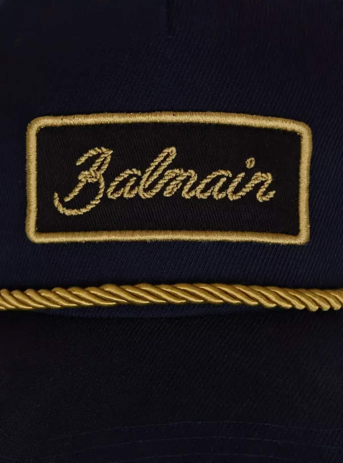 Cappellino in cotone con cordino