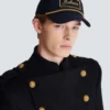 Cappellino in cotone con cordino