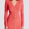 Cardigan a maniche lunghe con lavorazione a trecce Cardigan a maniche lunghe con lavorazione a trecce