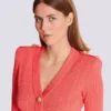 Cardigan a maniche lunghe con lavorazione a trecce Cardigan a maniche lunghe con lavorazione a trecce