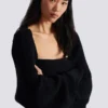 Cardigan bolero in maglia a coste