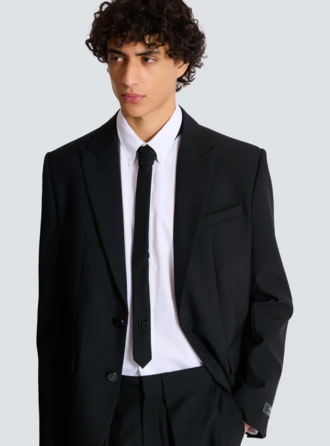 Cravatta slim in lana con ricamo PB
