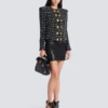 Giacca corta in tweed Giacca corta in tweed