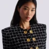 Giacca corta in tweed Giacca corta in tweed