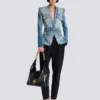 Giacca in denim con cintura e 1 bottone Giacca in denim con cintura e 1 bottone