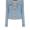 Giacca in denim con rifiniture in perle Giacca in denim con rifiniture in perle