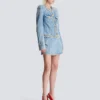 Giacca in denim con rifiniture in perle Giacca in denim con rifiniture in perle