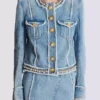 Giacca in denim con rifiniture in perle Giacca in denim con rifiniture in perle