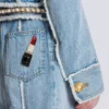 Giacca in denim con rifiniture in perle Giacca in denim con rifiniture in perle