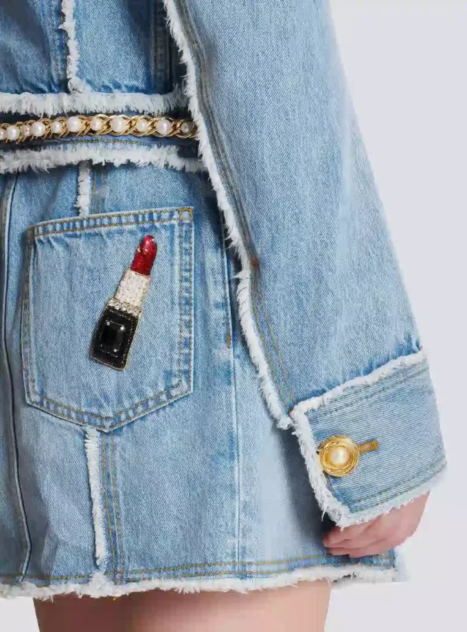 Giacca in denim con rifiniture in perle Giacca in denim con rifiniture in perle