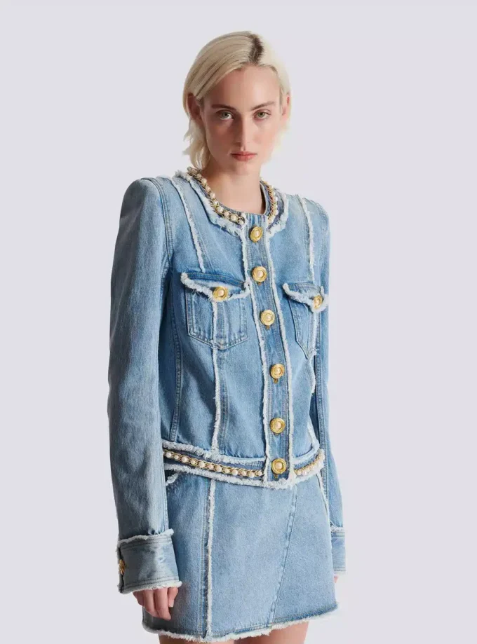 Giacca in denim con rifiniture in perle Giacca in denim con rifiniture in perle