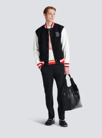 Giacca in lana e ecopelle stile college Giacca in lana e ecopelle stile college