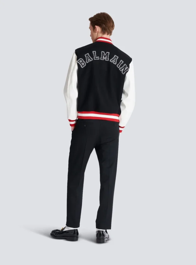 Giacca in lana e ecopelle stile college Giacca in lana e ecopelle stile college