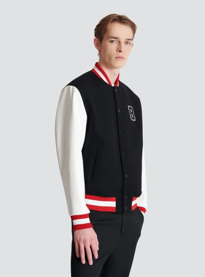 Giacca in lana e ecopelle stile college Giacca in lana e ecopelle stile college