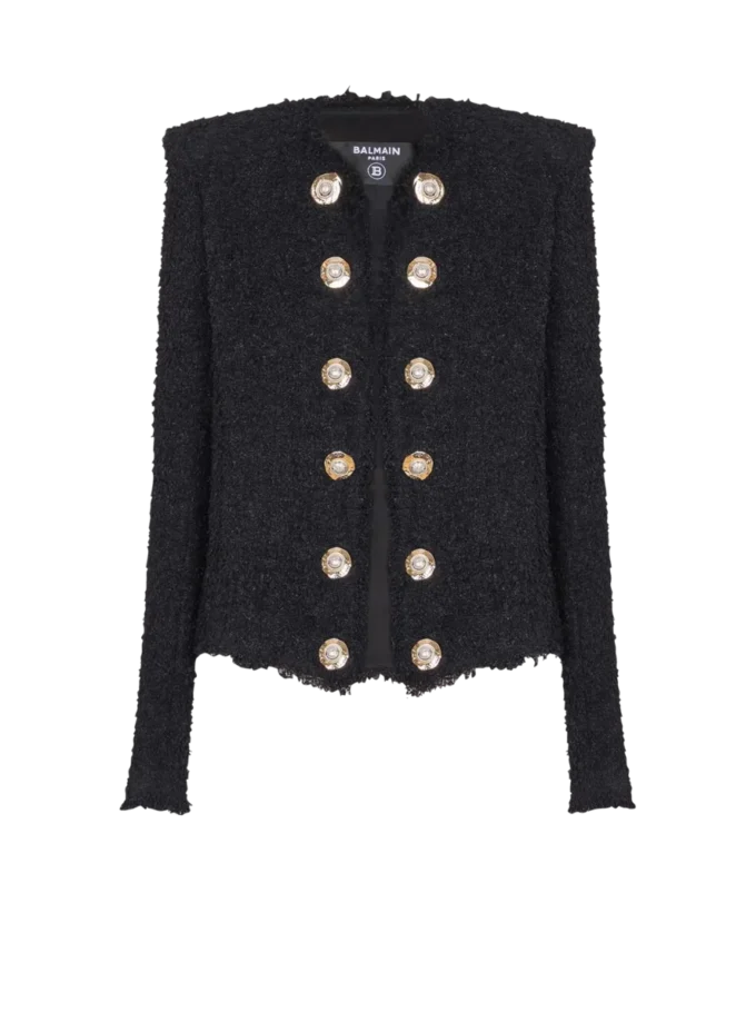 Giacca in tweed con bordi a filo Giacca in tweed con bordi a filo