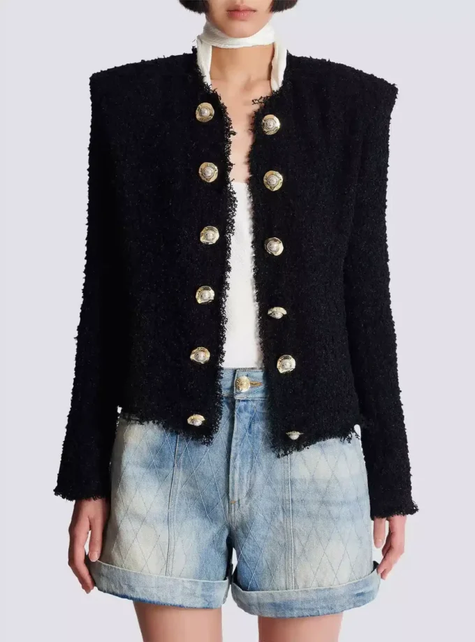 Giacca in tweed con bordi a filo Giacca in tweed con bordi a filo
