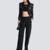Giacca sartoriale in raso glitterato con scollo a V Giacca sartoriale in raso glitterato con scollo a V