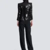 Giacca sartoriale in raso glitterato con scollo a V Giacca sartoriale in raso glitterato con scollo a V