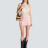 Gonna corta in tweed con paillettes Gonna corta in tweed con paillettes