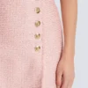Gonna corta in tweed con paillettes Gonna corta in tweed con paillettes