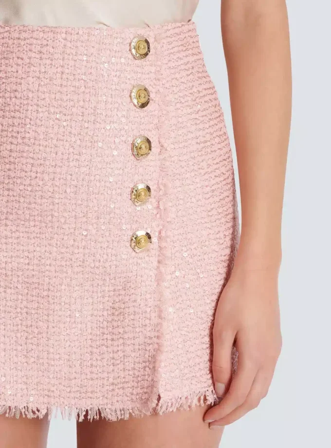 Gonna corta in tweed con paillettes Gonna corta in tweed con paillettes