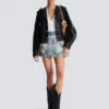 Gonna in denim con tasche Gonna in denim con tasche