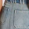 Gonna in denim con tasche Gonna in denim con tasche