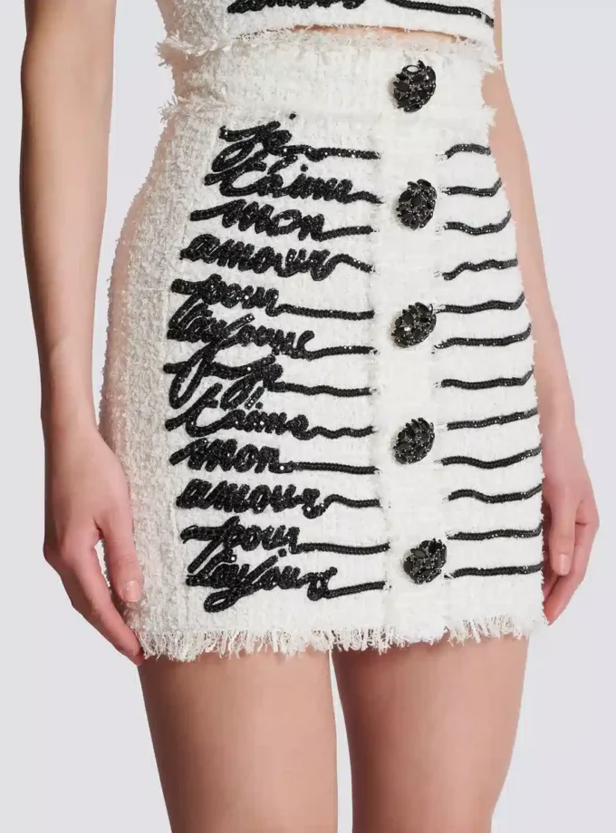 Gonna in tweed con ricamo a forma di lettera d’amore Gonna in tweed con ricamo a forma di lettera d’amore