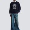 Jeans in denim slavato a gamba larga Jeans in denim slavato a gamba larga