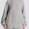 Maglione a collo alto in maglia a costine