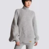 Maglione a collo alto in maglia a costine
