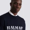 Maglione in lana merino con marchio Balmain Maglione in lana merino con marchio Balmain