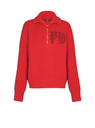 Maglione lavorato a trecce