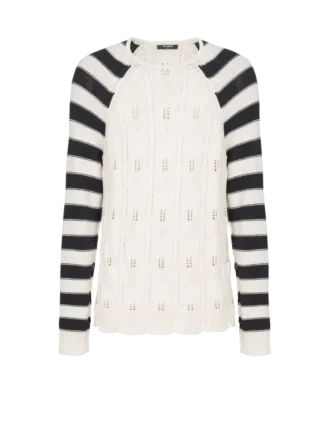 Maglione lavorato a trecce