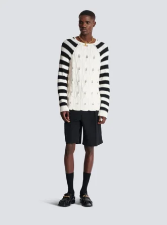 Maglione lavorato a trecce